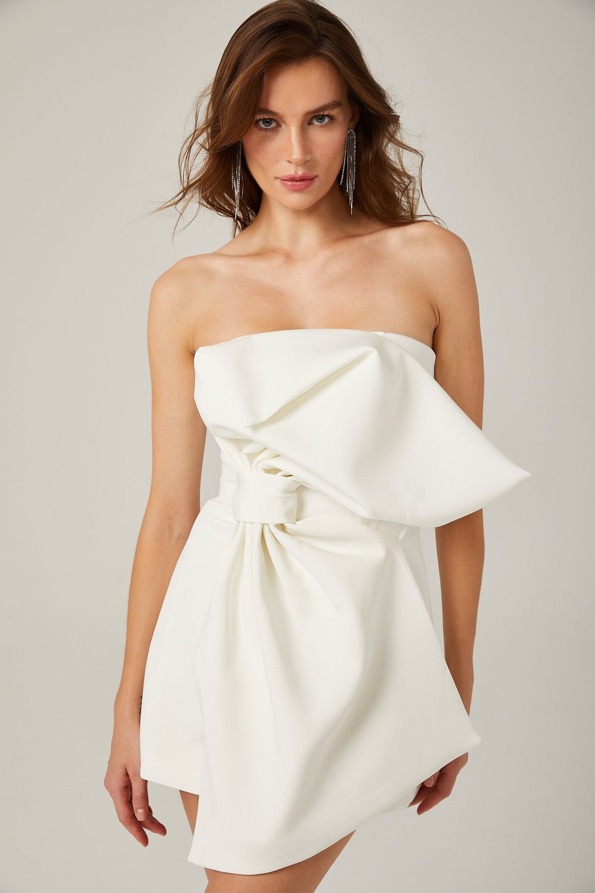 Charla white oversizebow asymmetric mini dress