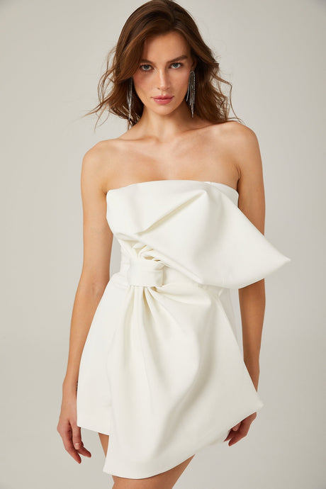 Charla white oversizebow asymmetric mini dress