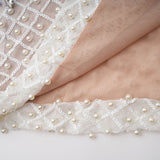 Claudine white embellished halterneck maxi dress