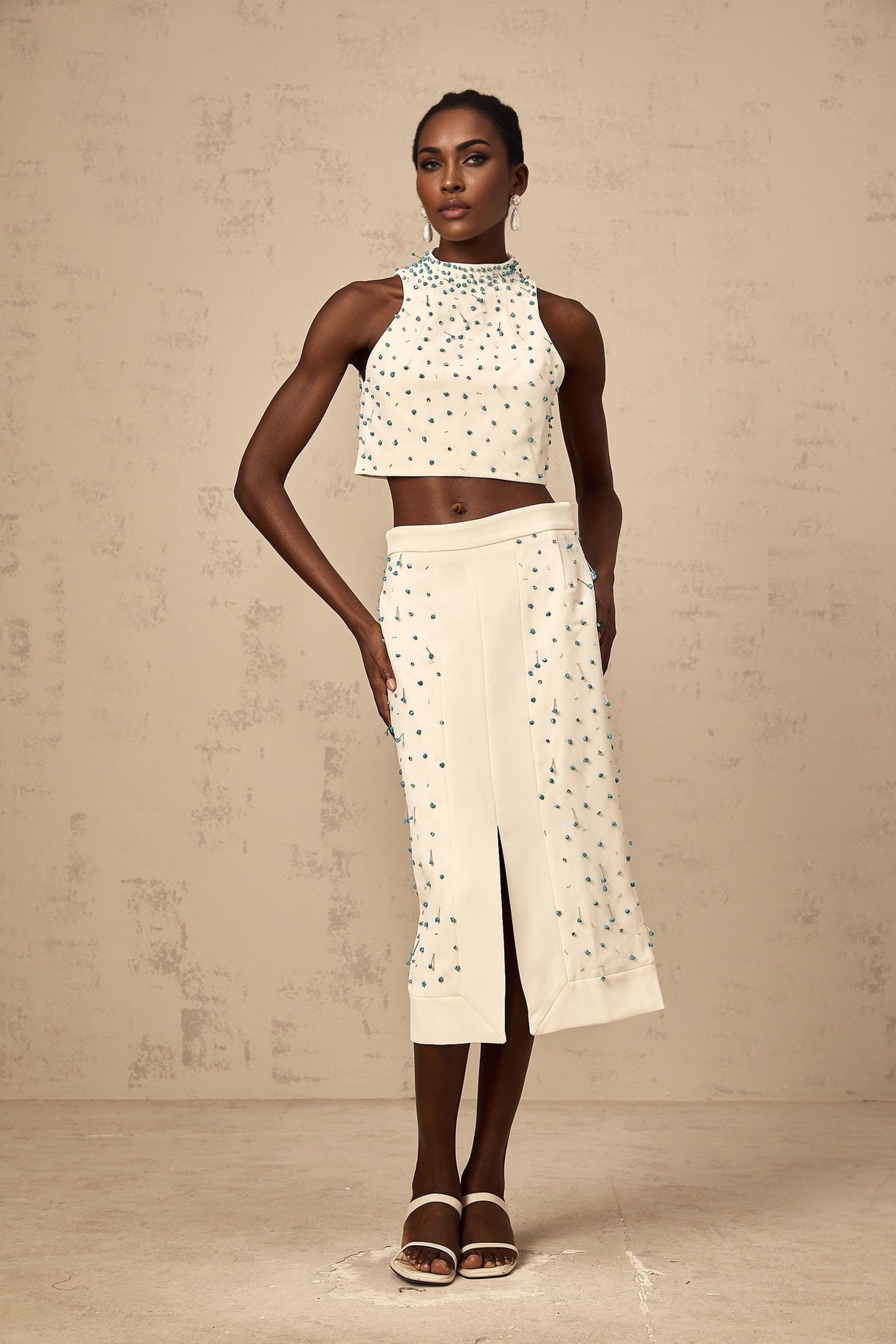 Clothilde off white embellished matching top and skirt set on display