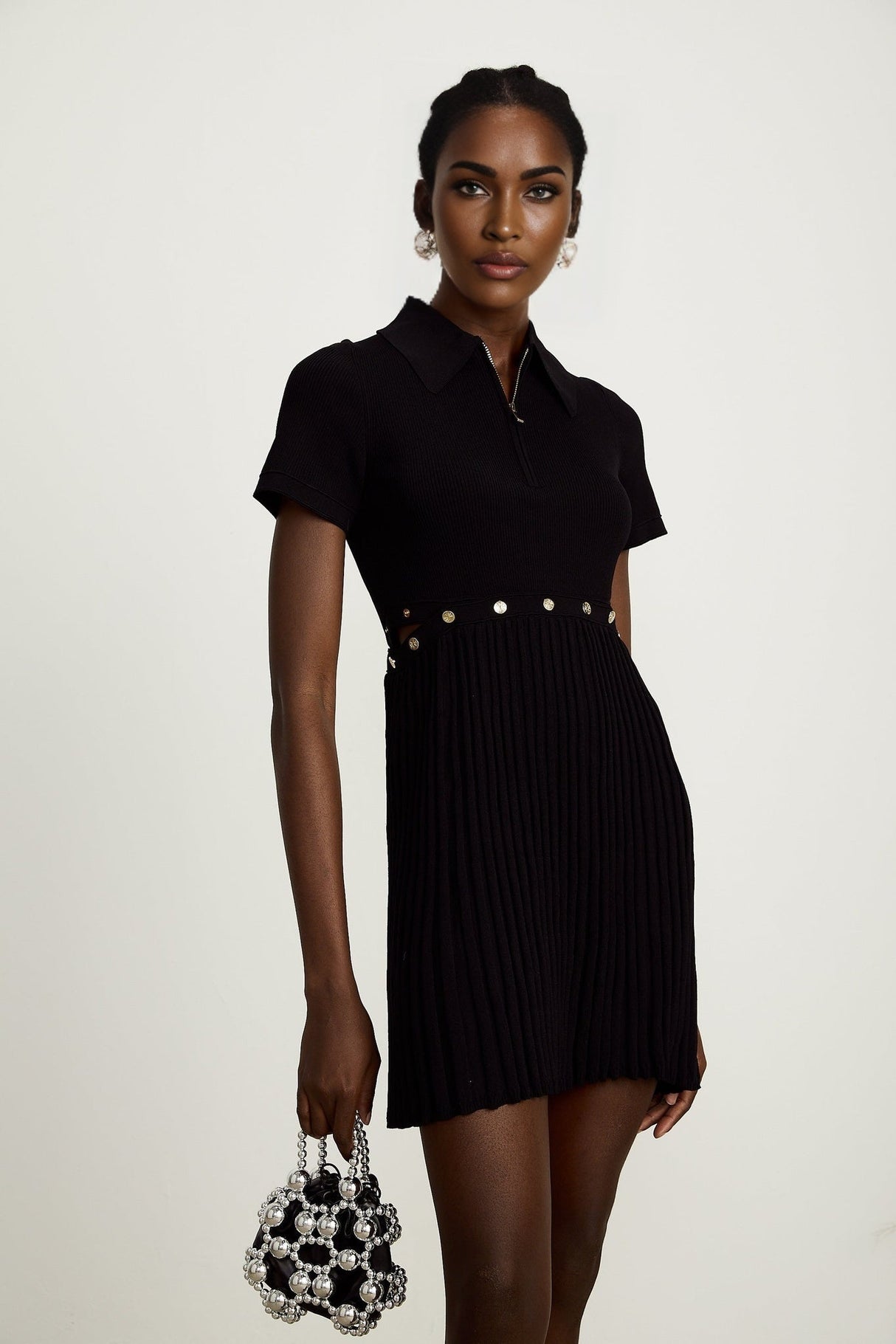 Coline black knitted pleated mini dress