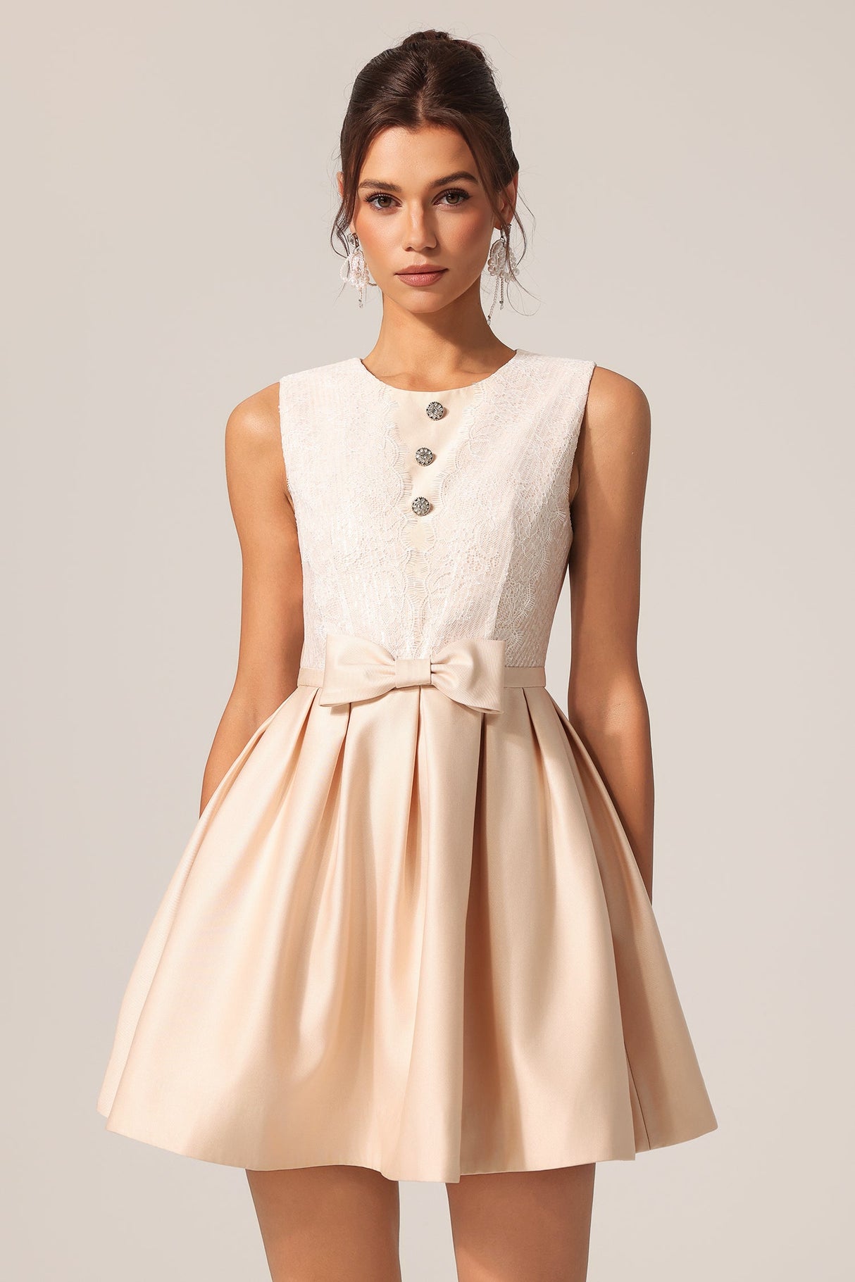 Costanza Beige Lace Sleeveless Mini Dress with Bow Detail and Button Accents