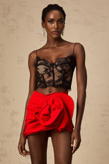 Cropped black vest top with delicate floral lace pattern and thin shoulder straps