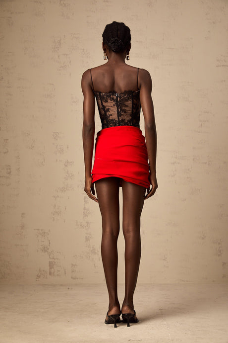 Cropped black vest top with delicate floral lace pattern sleeveless design and scoop neckline