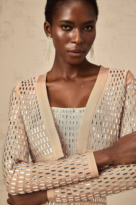 Cropped jacket with studs covering the surface in a decorative pattern featuring a structured silhouette and edgy design