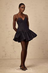 Dark blue denim mini dress with flounce detail and short sleeves named Genevieve