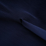 Debbie matching set featuring a blue pattern printed cape and creased skirt against a plain background