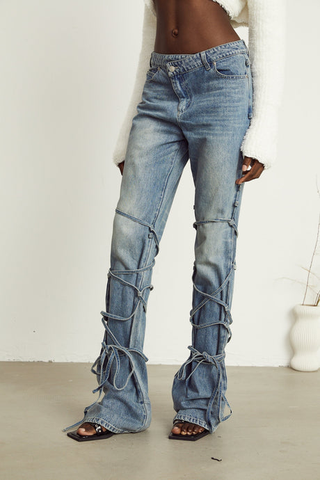 Diana Jeans - Strap Detailing - Whiskering Effect - Off - Center Button Fastening - Five Pockets