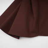 Dora brown mini dress with asymmetric neckline and puff sleeves