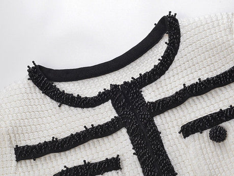 Dress - Fitted Silhouette With Flared Hem - Elegant Design With Pocket Detailing - Tailored Fit - Chic and Sophisticated Appearance