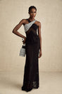Elegant black maxi dress with crystal embellishments and crossover design