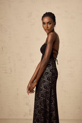 Elegant black maxi dress with open back and floral lace pattern