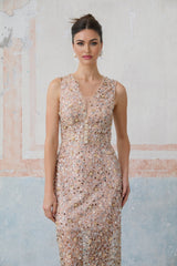 Elegant fitted midi dress with embellished floral motif featuring Marguerite flower design
