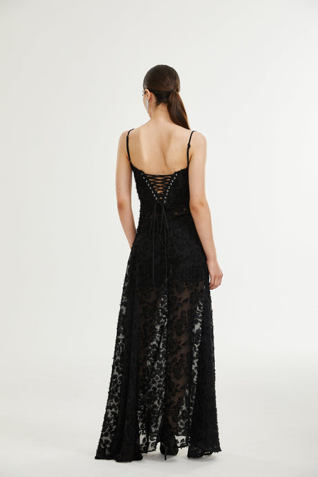 Elegant long white lace maxi dress with floral pattern and intricate details