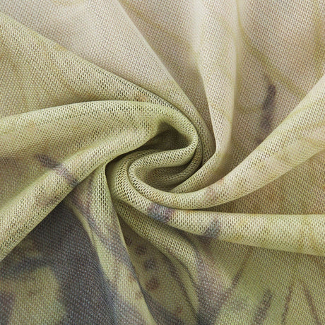 Elegant midlength dress with neckholder style featuring ombre print in soft flowing fabric