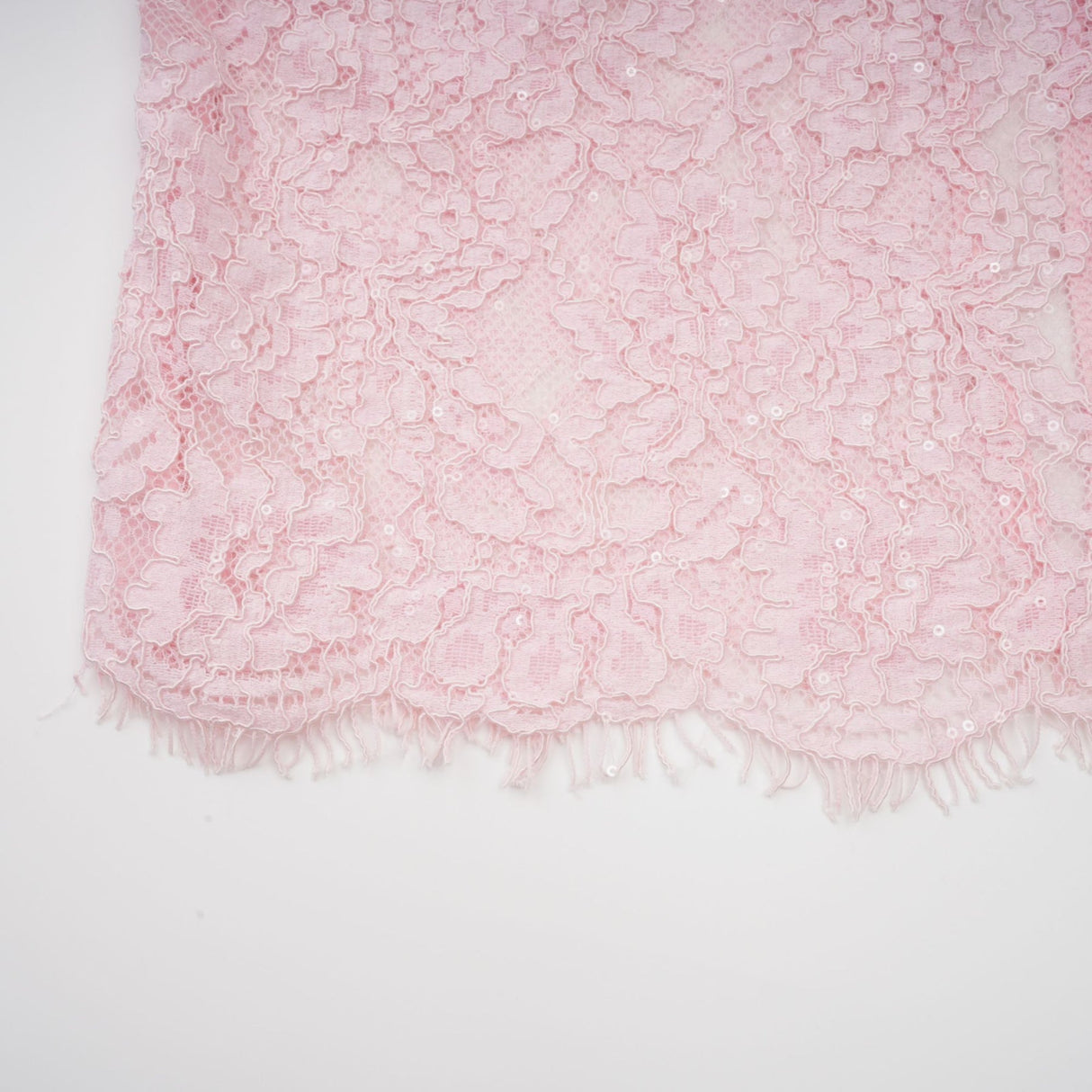 Elegant pink midi dress featuring floral embroidery and lace detailing with embellishments