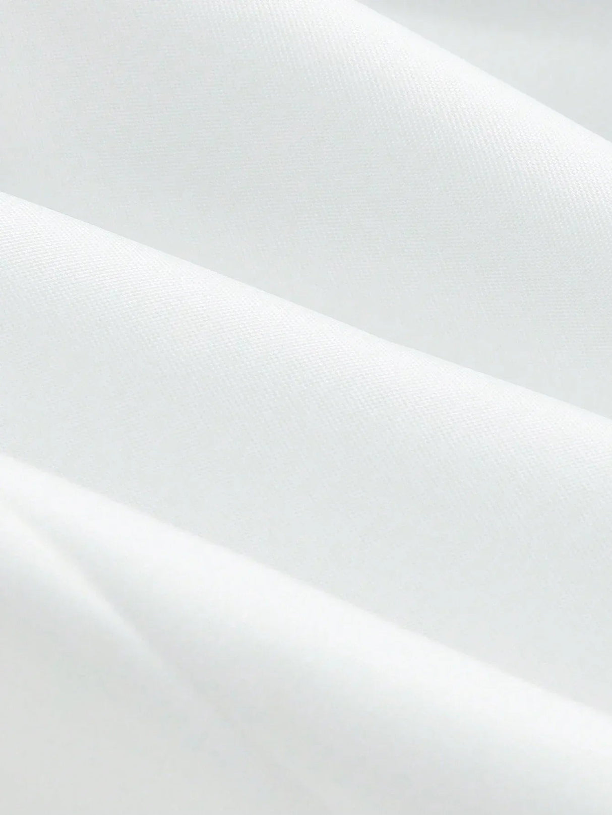 Elegant and versatile, this pristine white dress features a flattering, tailored fit that gracefully hugs the body while.