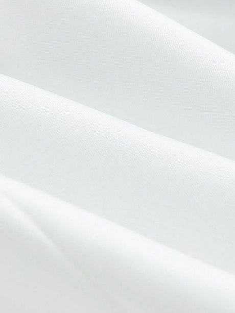 Elegant and versatile, this pristine white dress features a flattering, tailored fit that gracefully hugs the body while.