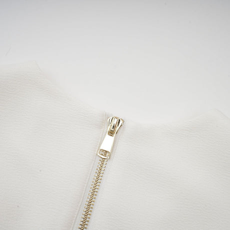 Élise pleated peplumhem blazer dress in White