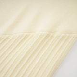Émeline white knitted pleated midi dress