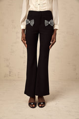 Flared trousers with a decorative bow detail named Gelsomina