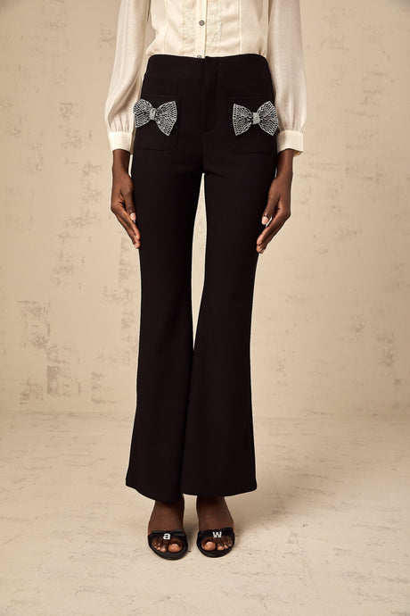 Flared trousers with a decorative bow detail named Gelsomina