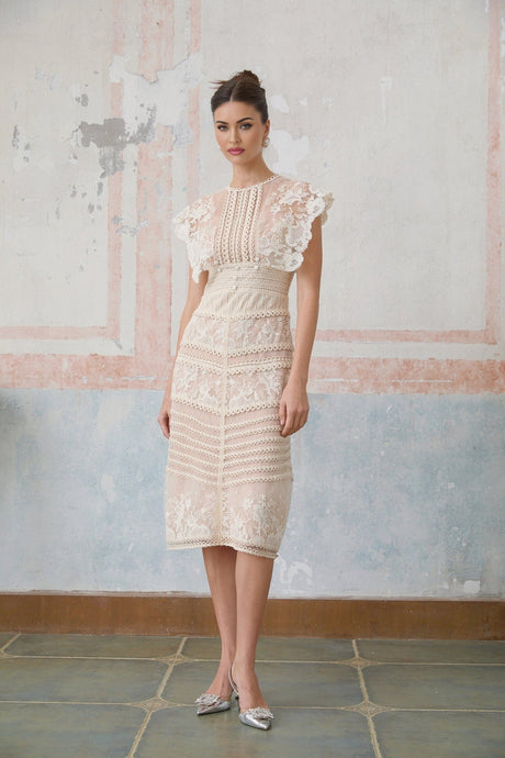 Fleur floral embroidered lace midi dress in neutral colors displayed on a mannequin or model against a plain background