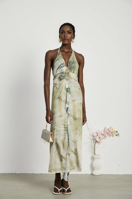 Flowy midlength dress with neckholder style and ombre print pattern fading from dark to light