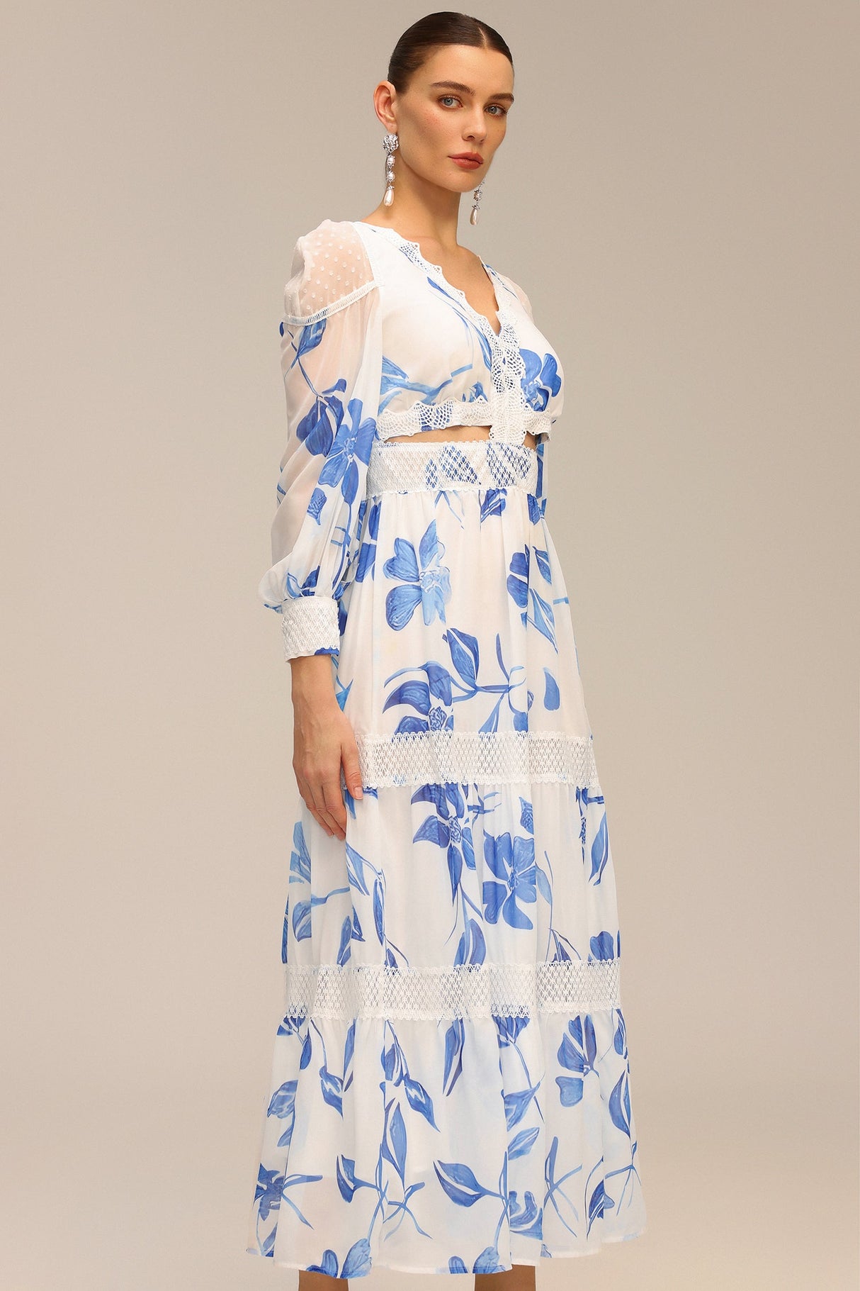 Gemmina White Floral Print Maxi Dress with Cut-Out Waist and Lace Accents