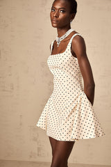 Geneviève neutrals polka dot puff sleeve mini dress on white background
