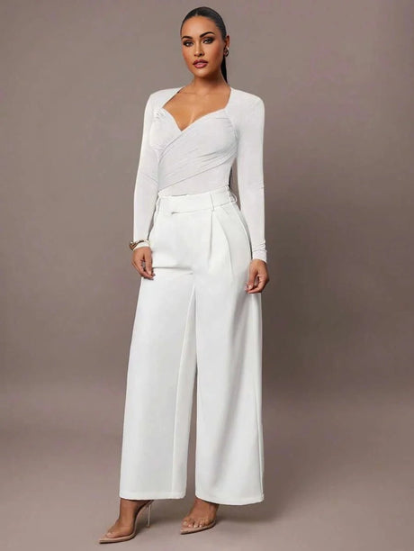 Gianna Bodysuit - Slim Fit - Knitted Fabric (93% Polyester, 7% Elastane) - Natural Waist Line (mid Waist) - Regular Long Sleeves - Modern Look