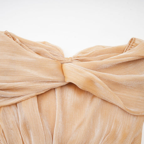 Gold mini dress with crystal embellishments and paneled design named Adelina