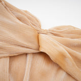Gold mini dress with crystal embellishments and paneled design named Adelina