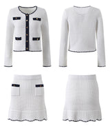 White knit cardigan with navy accents and gold buttons paired with a matching A-line skirt featuring a flared hem