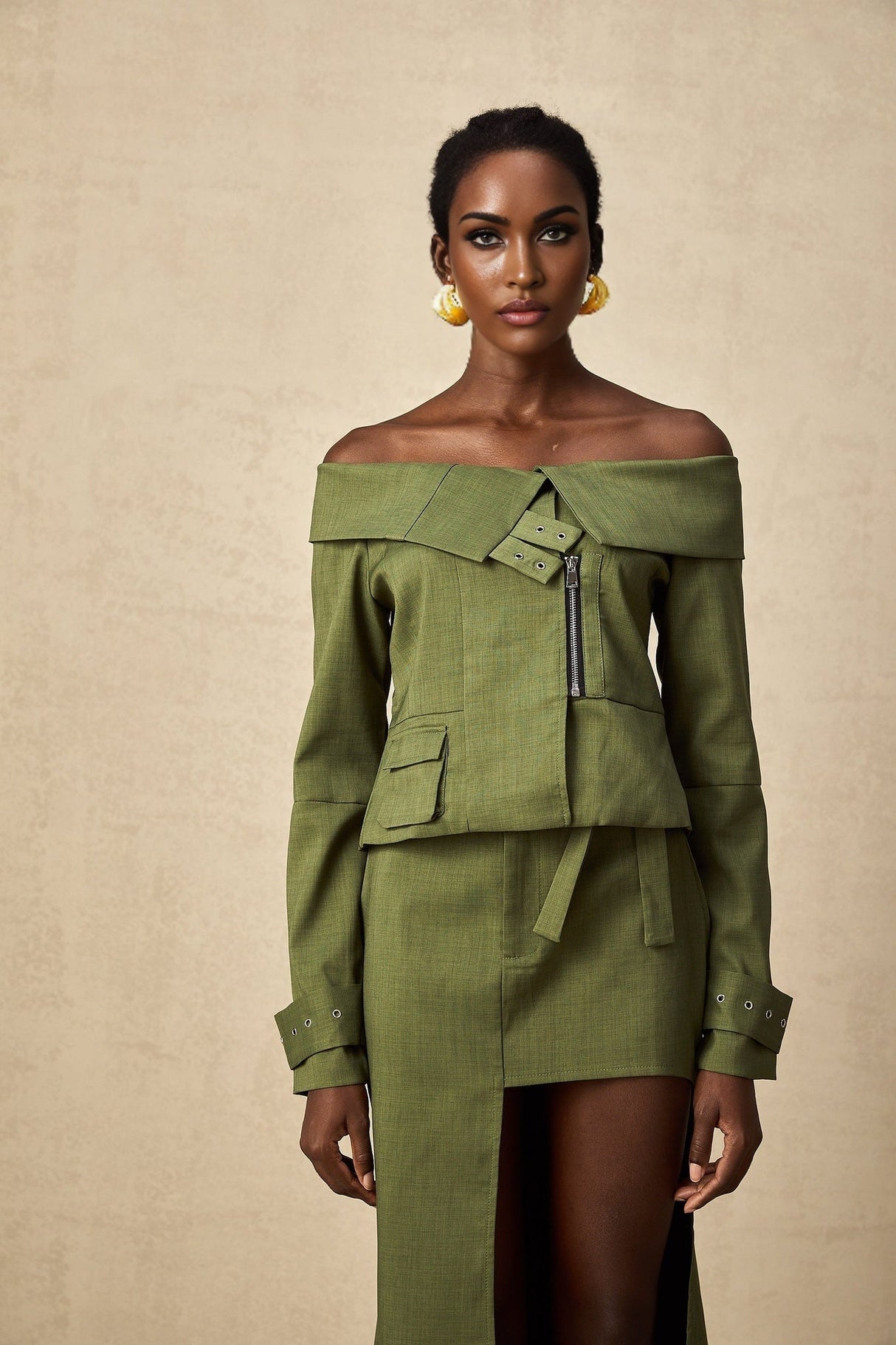 Green asymmetric jacket and skirt set called Elena featuring matching design