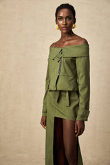 Green asymmetric jacket and skirt set named Elena featuring matching design