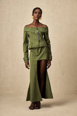 Green asymmetric jacket and skirt set named Elena featuring matching design