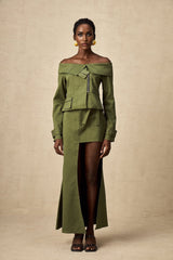 Green asymmetric jacket and skirt set named Elena featuring matching design