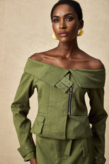 Green asymmetric jacket and skirt set named Elena featuring matching design