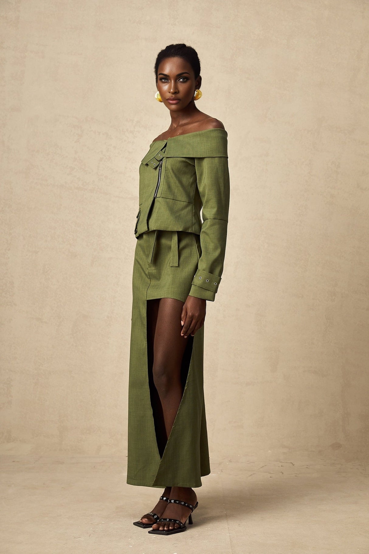 Green asymmetric jacket and skirt set named Elena matching outfit with modern design