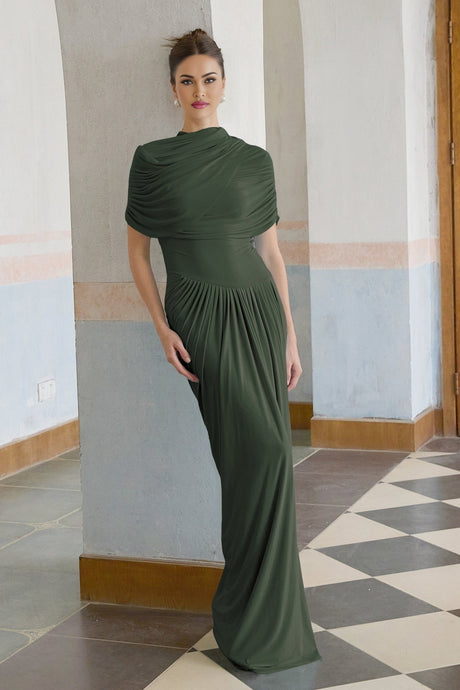 Green asymmetric pleated maxi dress named Catherine on a plain background