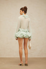 Green chiffon blouse and skirt set with flounced details and matching design