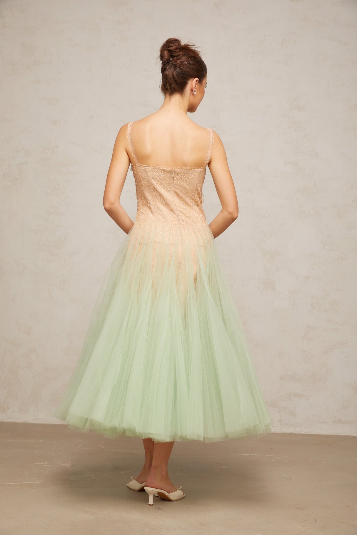 Green midi dress with lace panels and tulle skirt