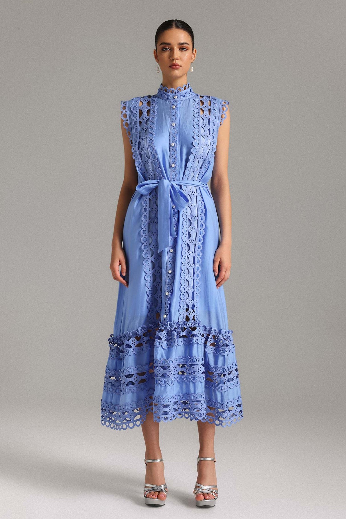 Guendalina Blue Lace Sleeveless Dress High Neckline Midi Length Tie Waist Elegant Sophisticated Versatile Chic Accessories Contemporary Sophistication Graceful Fabric Flattering Silhouette Fashion-forward Individual Formal Events Casual Outings American English SEO Optimized Image Alt Text