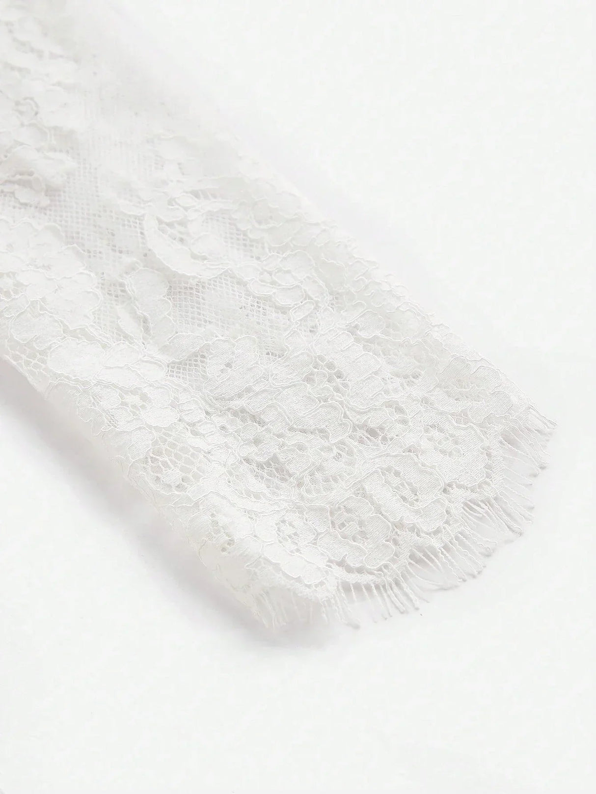 Delicate and romantic, this white lace dress features intricate floral patterns and a soft, flowing fit that adds elegance.