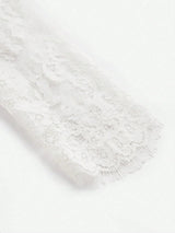 Delicate and romantic, this white lace dress features intricate floral patterns and a soft, flowing fit that adds elegance.