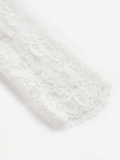 Delicate and romantic, this white lace dress features intricate floral patterns and a soft, flowing fit that adds elegance.