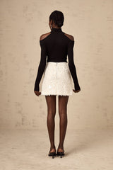 Heres a simple alt text for the product image based on the title

White mini skirt with sequin embellishment