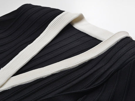 Ida Cardigan - Fitted Peplum Silhouette - Ribbed Texture - Tailored Fit - Chic Elegance - Gold Button Embellishments