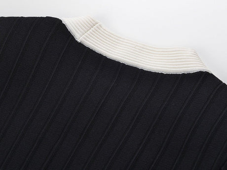 Ida Cardigan - Fitted Peplum Silhouette - Ribbed Texture - Tailored Fit - Chic Elegance - Gold Button Embellishments